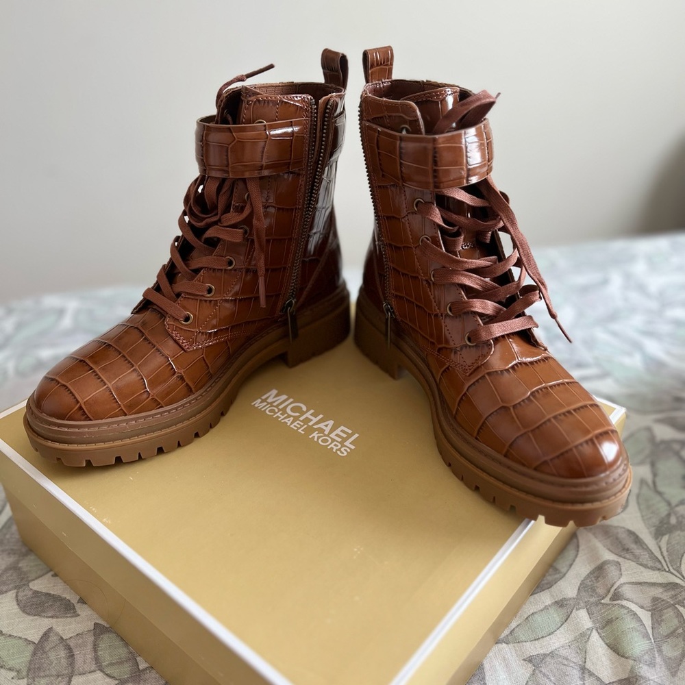 Brand New Michael Kors boots, never used, came in their original box.